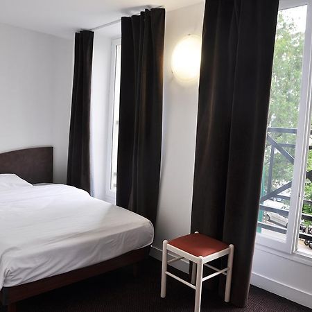 Hotel de la Tour París Habitación foto
