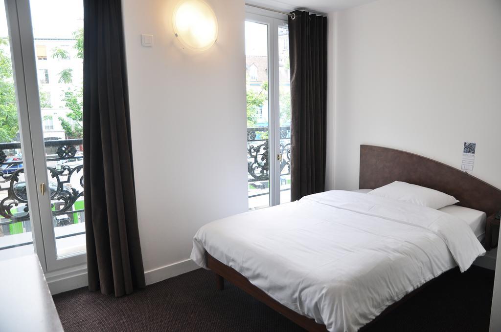 Hotel de la Tour París Habitación foto